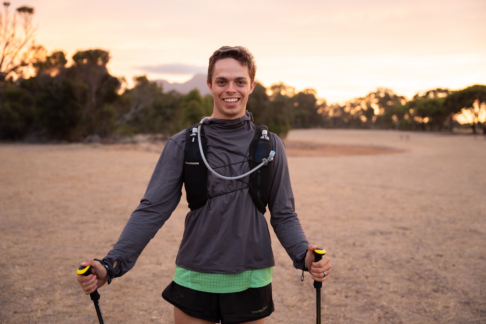 Jake Reid with Tread Carbon Trekking Poles & Salomon backpack