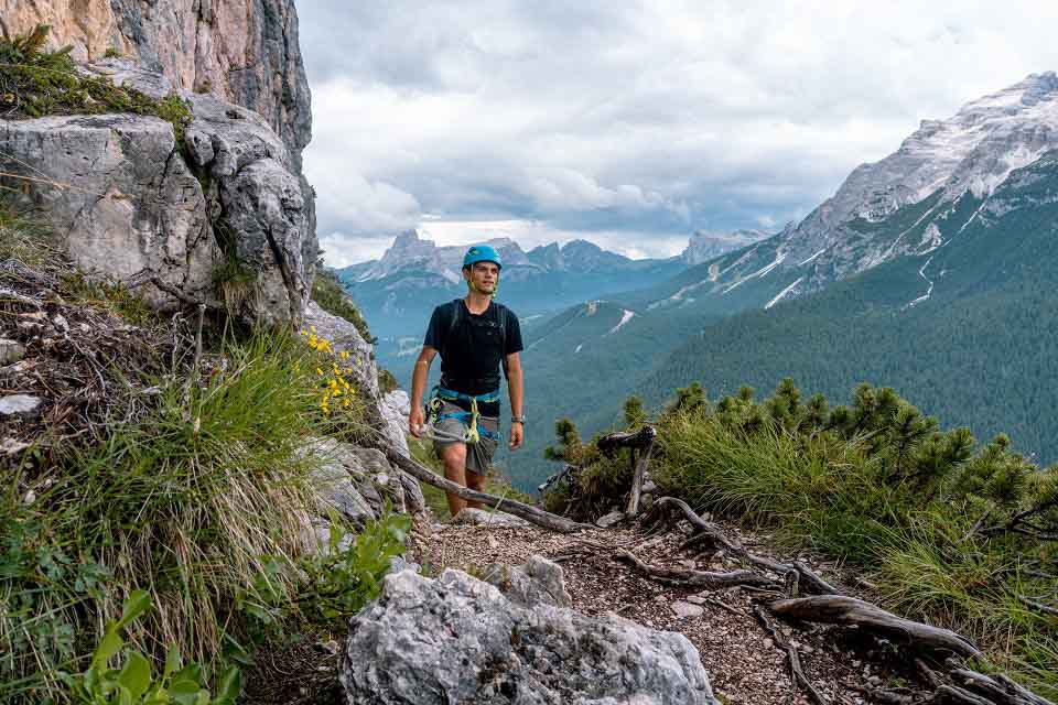 Zack Bostock walking on the trail