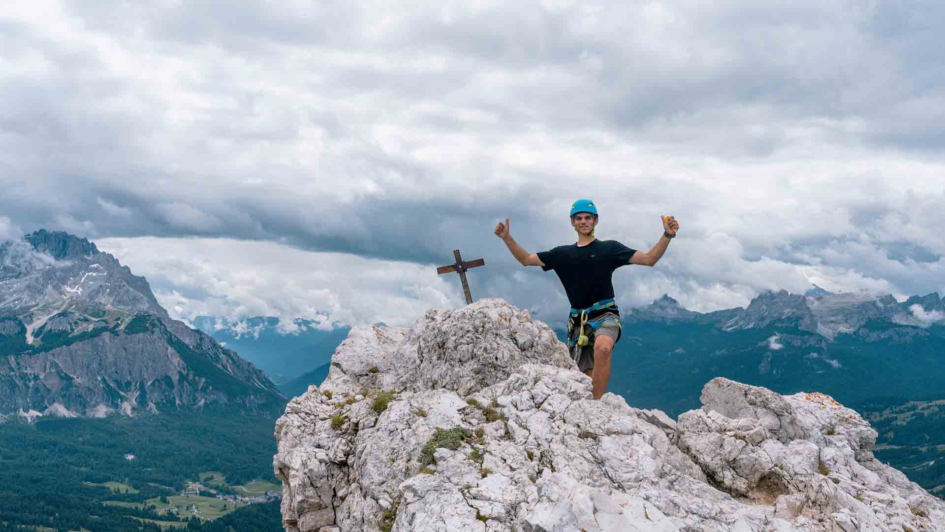 Zack Bostock thumbs up at the summit