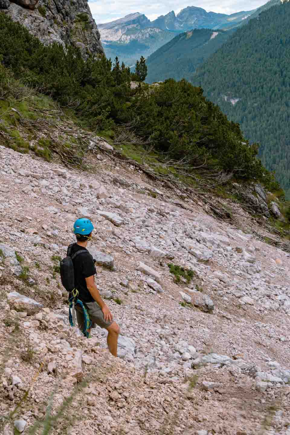 Zach Bostock wearing a blue helmet in case of loose rocks